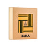A brown box with name Kapla with green and yellow wooden planks inside on a white background