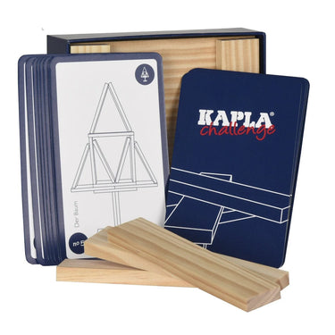 Cards with outlines of designs, small planks of wood and a blue box on a white background 
