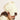Person wearing a lion mane hat with a neutral background