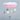 Pink cloud-shaped mobile with hanging stars on a light blue background