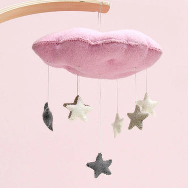 Pink cloud-shaped mobile with star-shaped hanging objects on a pink background