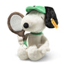 Plush Snoopy from peanuts in a green cap and tennis racket on a white background